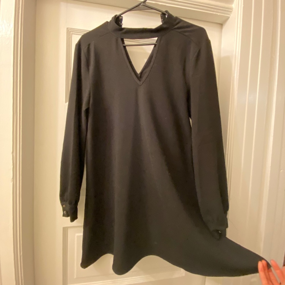 Black dress with triangle scoop neck and back